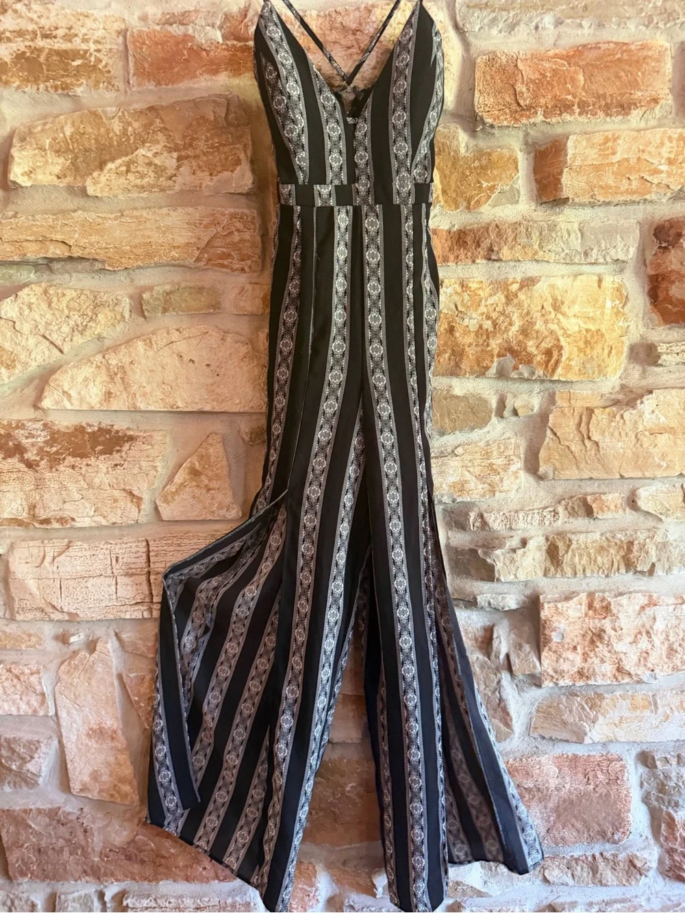 Black & White Striped V‑Neck Spaghetti‑Strap Jumpsuit